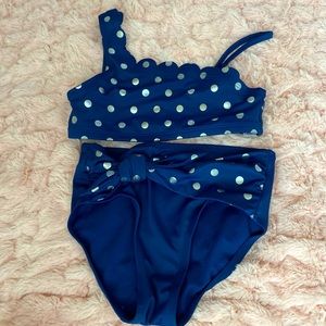 Cute navy bathing suit.